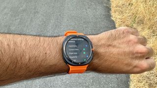 The Samsung Galaxy Watch Ultra showing the author's running stride data after a run.