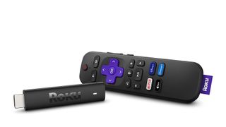 The Roku Streaming Stick 4K and remote on a white background