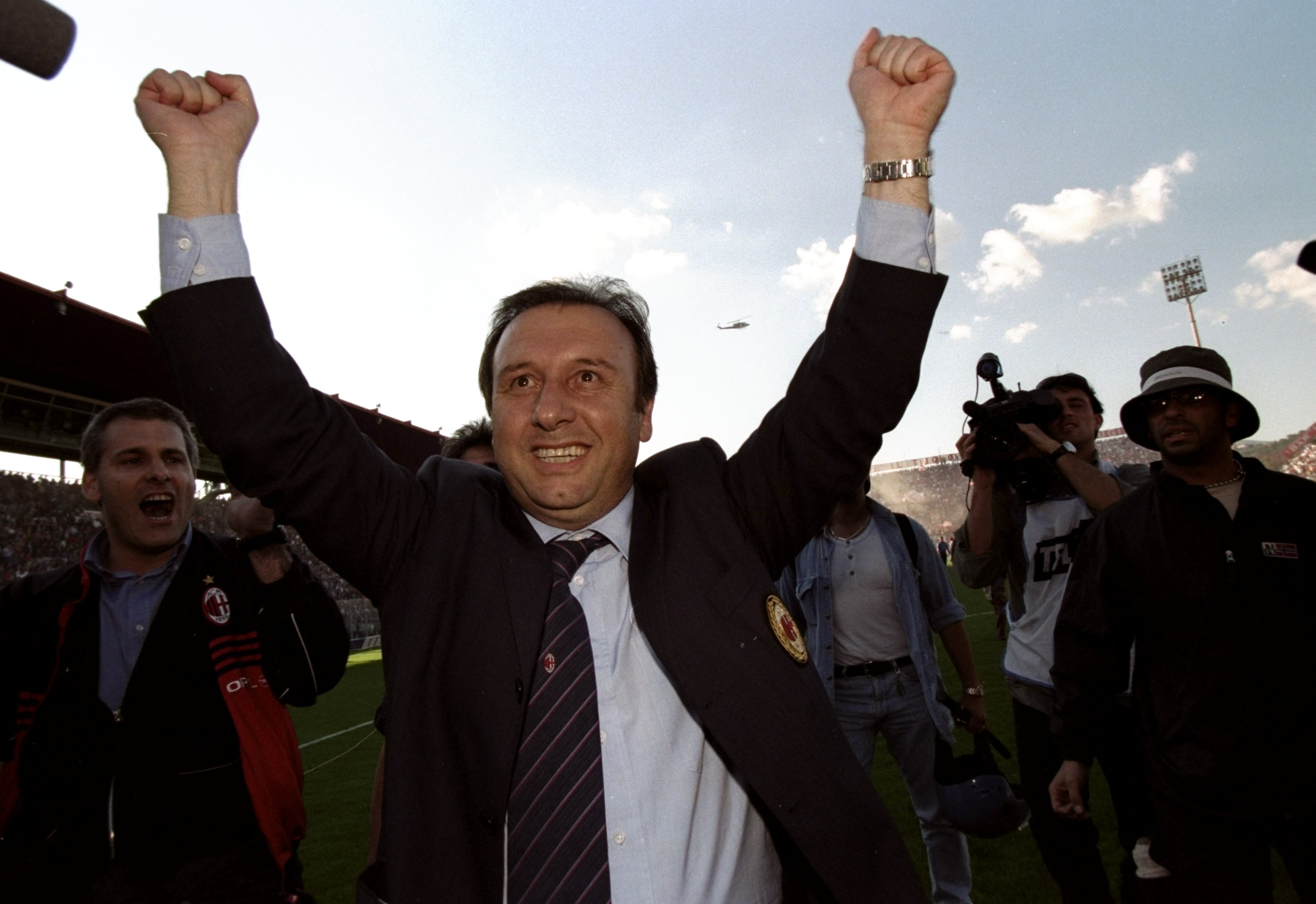 AC Milan coach Alberto Zaccheroni celebrates after victory at Perugia clinches the Serie A title in May 1999.