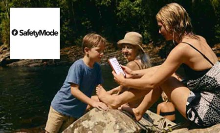 safetymode top left with three people sitting on a rock