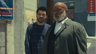 Justice Smith and David Alan Grier stand looking cautious in The American Society of Magical Negroes.