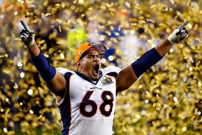 Ryan Harris of the Denver Broncos celebrates his team's win at Super Bowl 50.