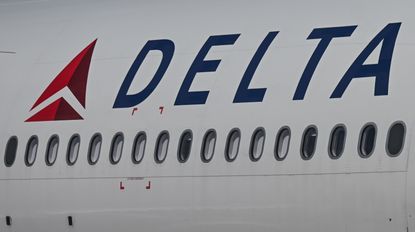 Delta Air Lines plane with logo.