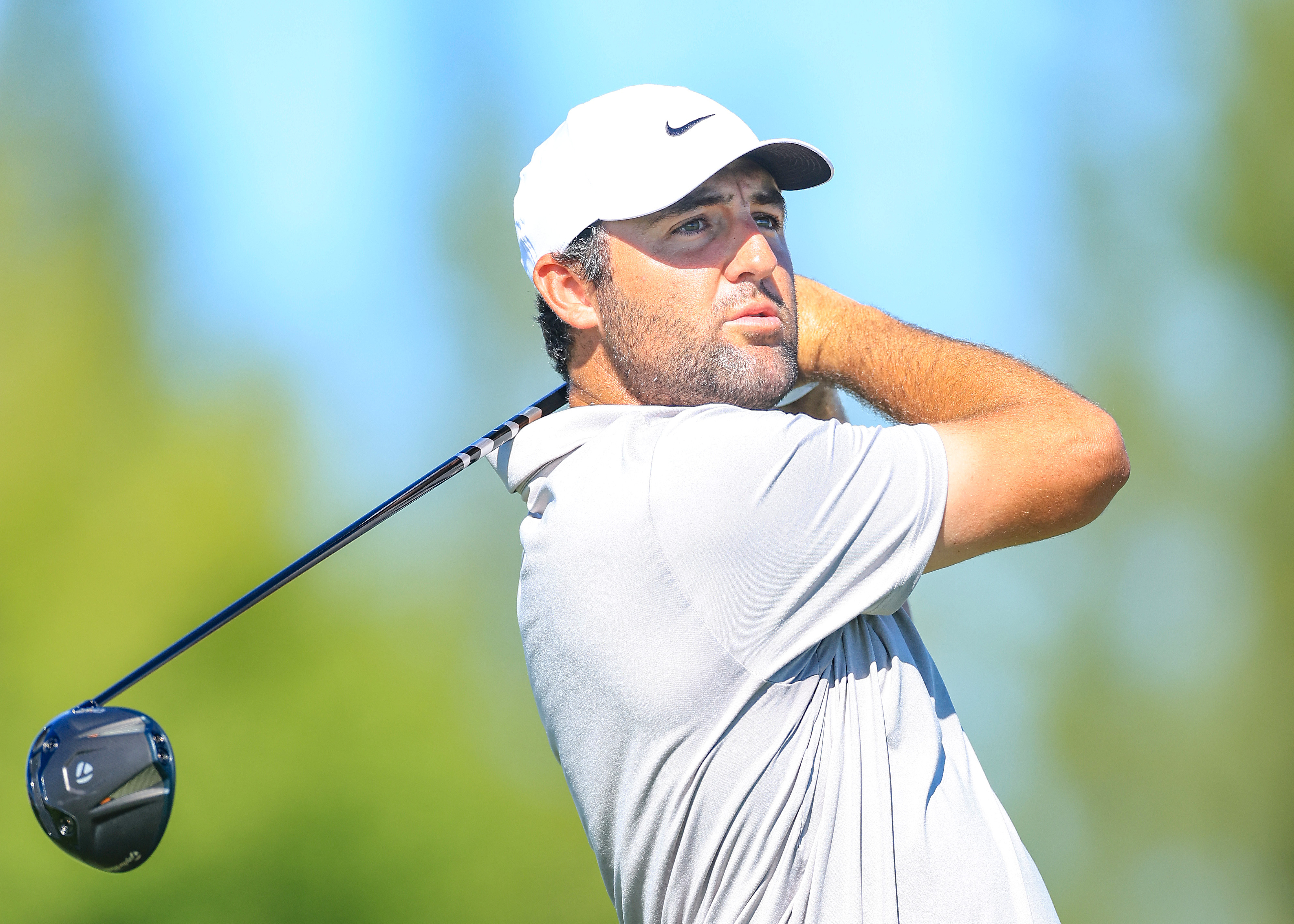 Scottie Scheffler hits a driver off the tee