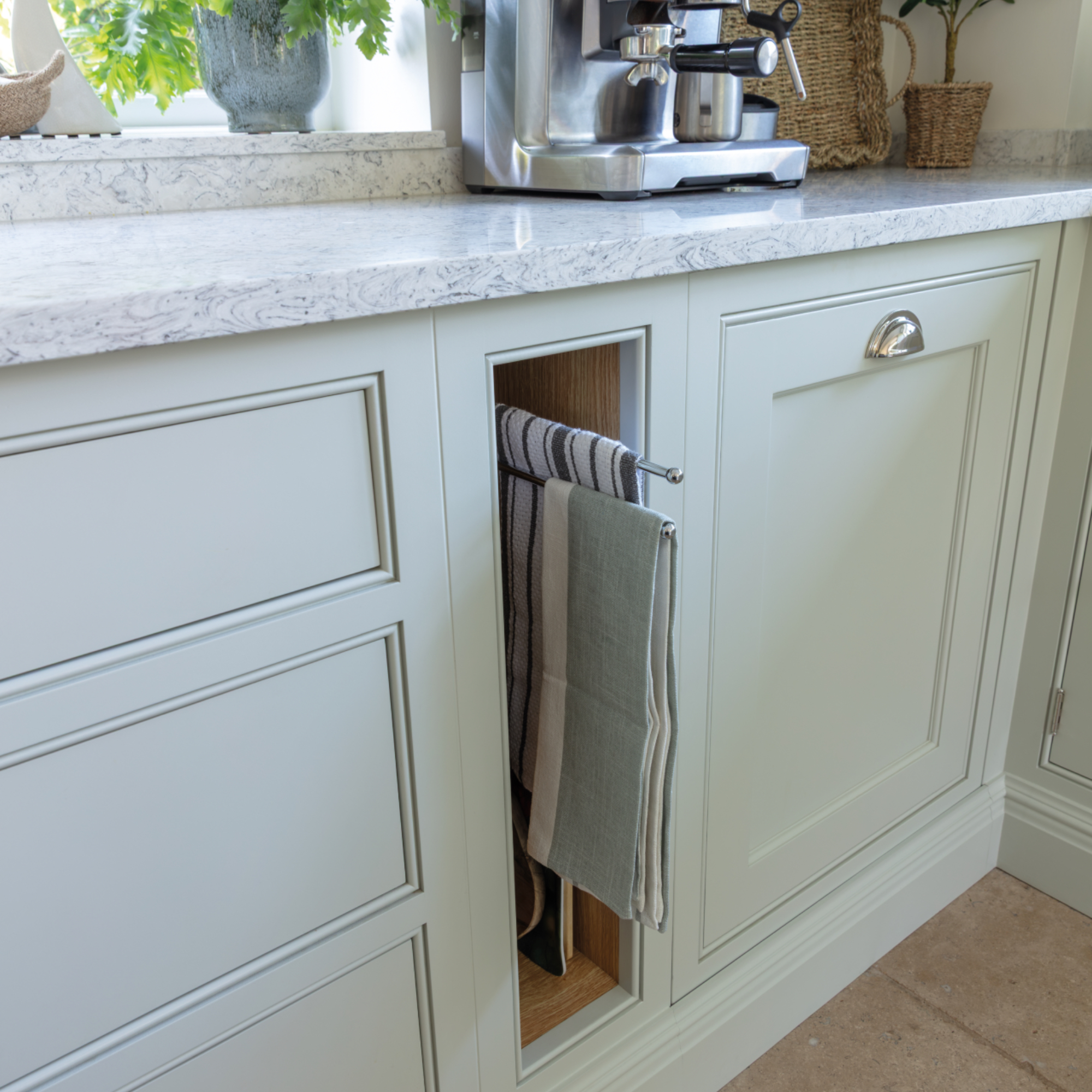 detail of tea towel/small storage solutions in Tom Howley kitchen