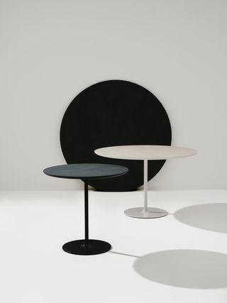 Milan Design Week Arper Dizzie round dining tables in black and white