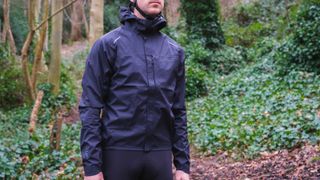 A cyclist wearing the Endura GV500 Waterproof Jacket