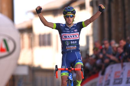Guillaume Martin celebrates his victory at the Giro della Toscana