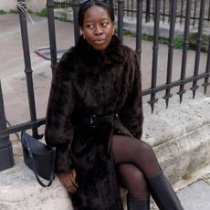 Black knee-high boots.