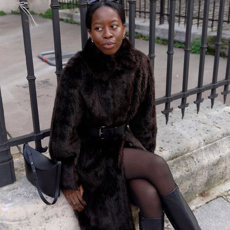 Black knee-high boots.