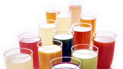 a lot of different colored juices