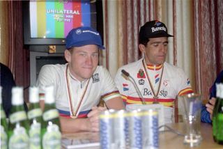 Lance Armstrong smiles, Miguel Indurain looks less than impressed