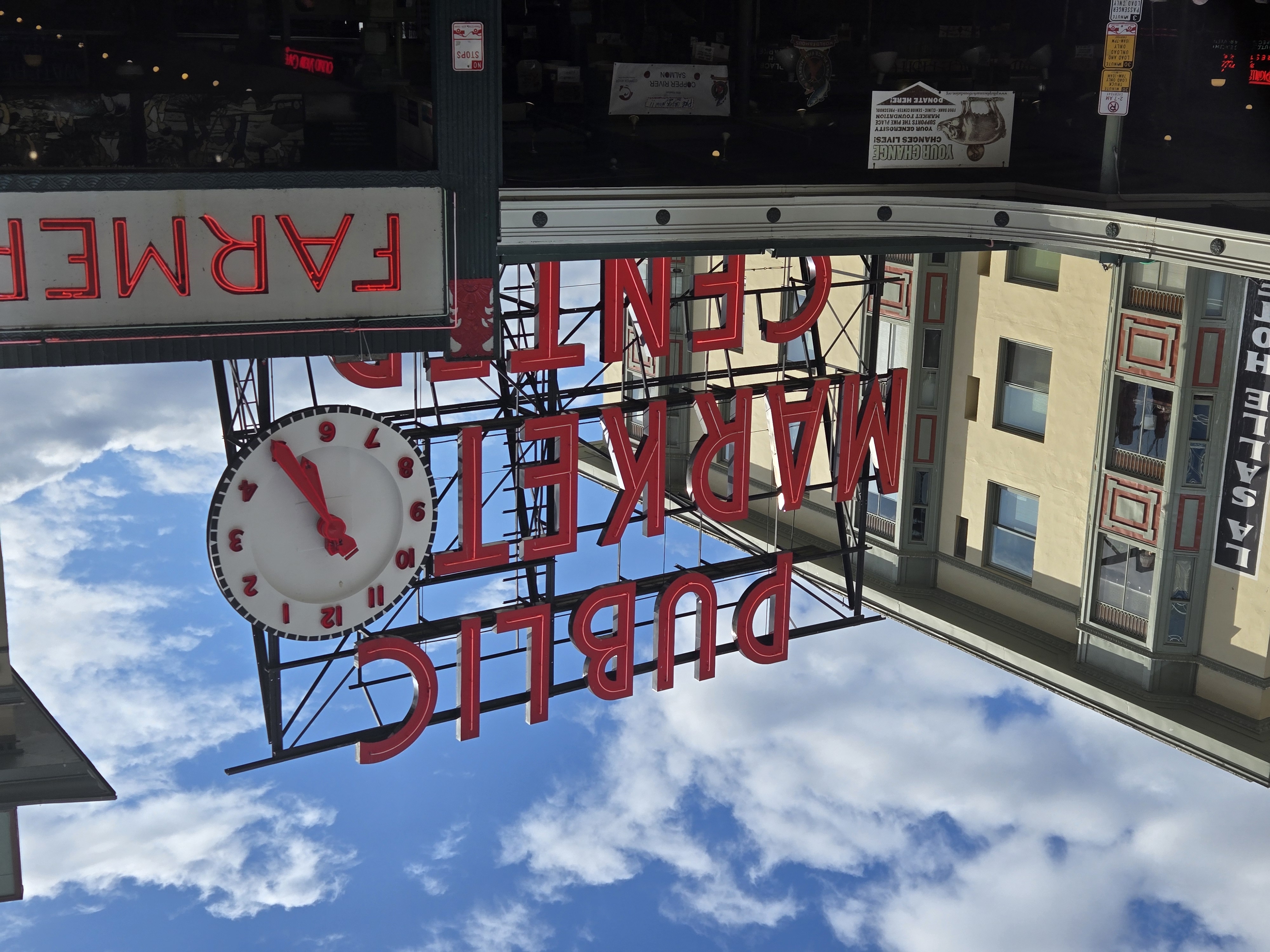 A red Public Market Center sign