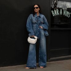 Flared denim with jean jacket and strappy heels