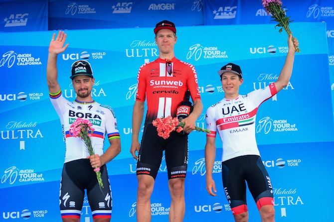 Cees Bol (Team Sunweb) tops the stage 7 podium at the 2019 Tour of California, flanked by Peter Sagan (Bora-Hansgrohe) and third-placed Jasper Philipsen (UAE Team Emirates)