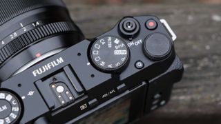 Close up of the mode dial on a Fujifilm X-M5 camera