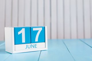 June 17 calendar blocks on a table