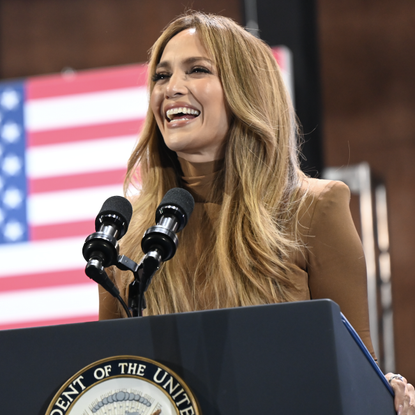 Jennifer Lopez wears a brown bodycon dress at vice president kamala harris' las vegas rally