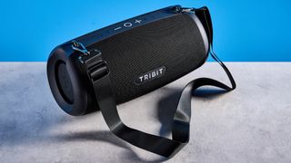 Tribit StormBox Lava Bluetooth Speaker photographed in front of a blue background.