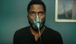 Tenet John David Washington wearing an oxygen mask