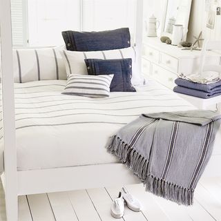 bedroom with white wooden floor