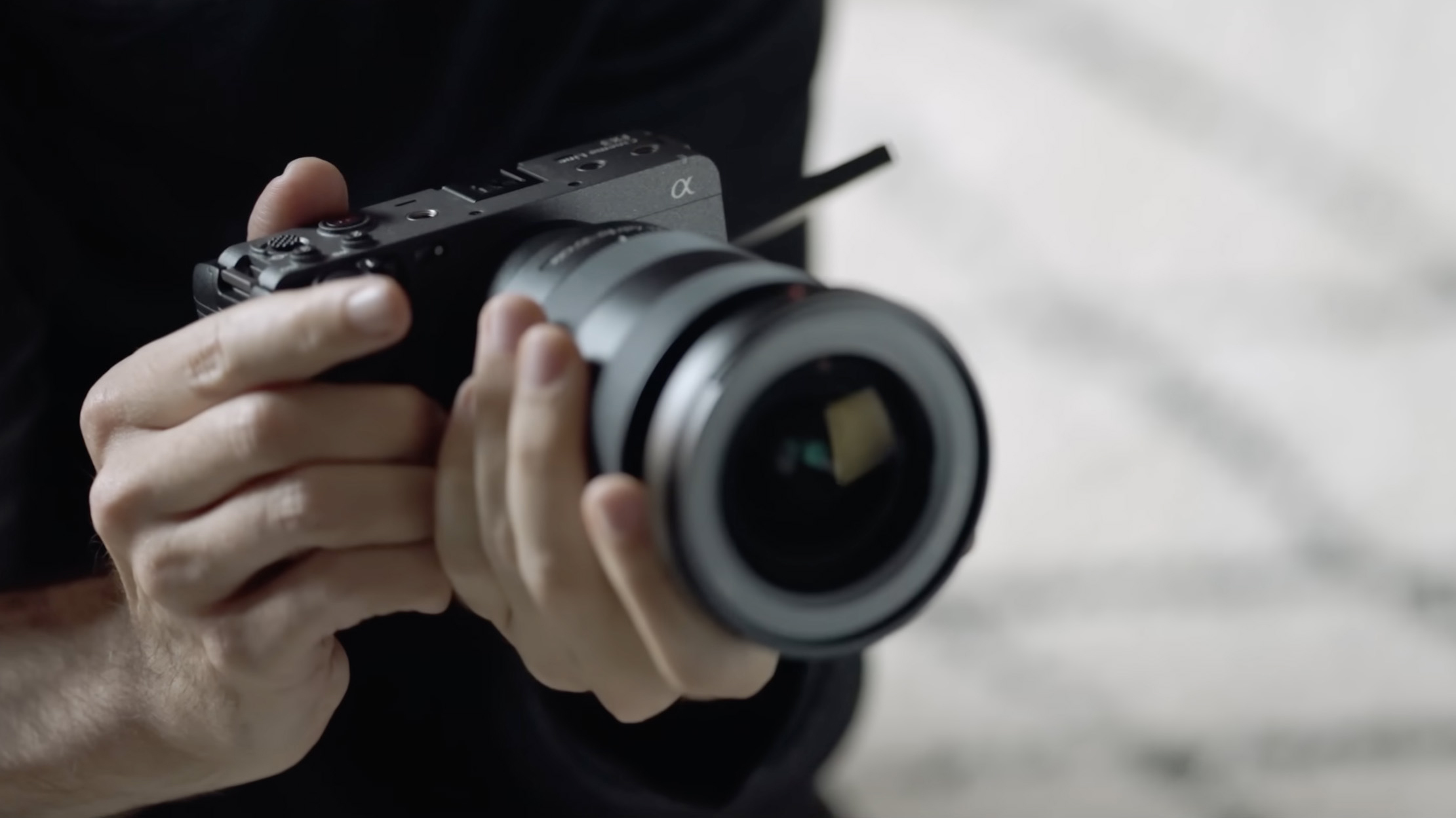 Videographer holding a Sony FX3