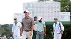 Rory McIlroy walks off the green at The Masters