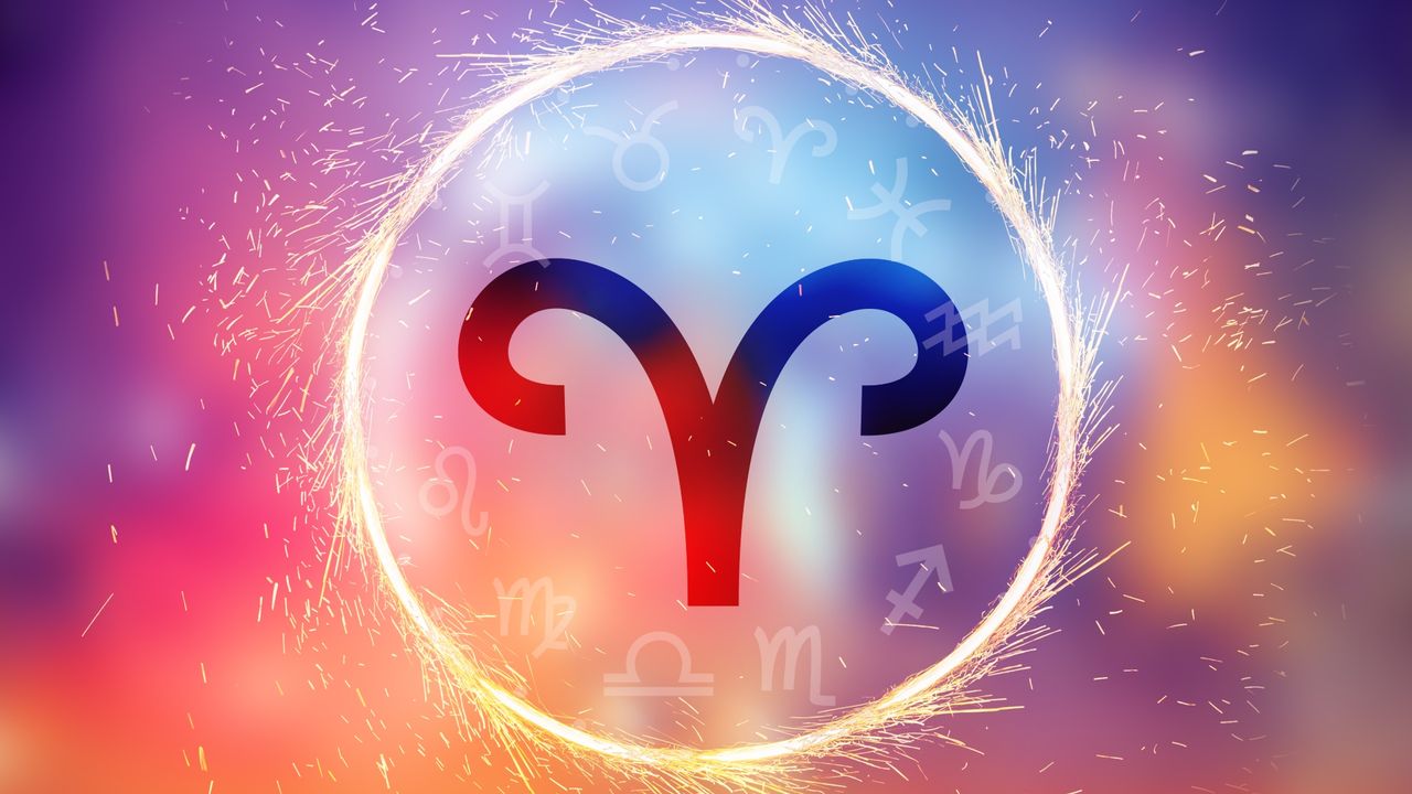 Aries symbol on colorful background.