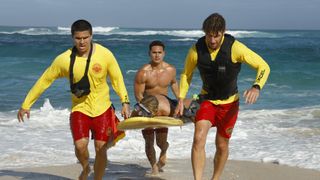 Alex Aiono, Kekoa Kekumano and Adam Demos performing a rescue in Rescue: HI-Surf