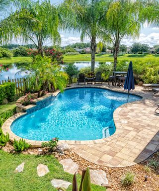 landscaped backyard pool