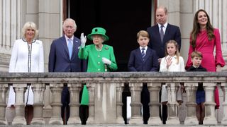Camilla, Duchess of Cambridge, Prince Charles, Prince of Wales, Queen Elizabeth II, Prince George of Cambridge, Prince William, Duke of Cambridge Princess Charlotte of Cambridge, Prince Louis of Cambridge and Catherine, Duchess of Cambridge stand on the balcony