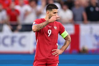 Serbia Euro 2024 squad Aleksandar Mitrovic of Serbia looks dejected during the UEFA EURO 2024 group stage match between Serbia and England at Arena AufSchalke on June 16, 2024 in Gelsenkirchen, Germany. (Photo by Robbie Jay Barratt - AMA/Getty Images)