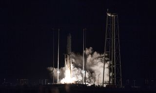The twin engines on Northrop Grumman's Antares rocket first stage ignite to launch a Cygnus cargo ship to the International Space Station from NASA's Wallops Flight Facility on Virginia's Eastern Shore on Nov. 17, 2018.
