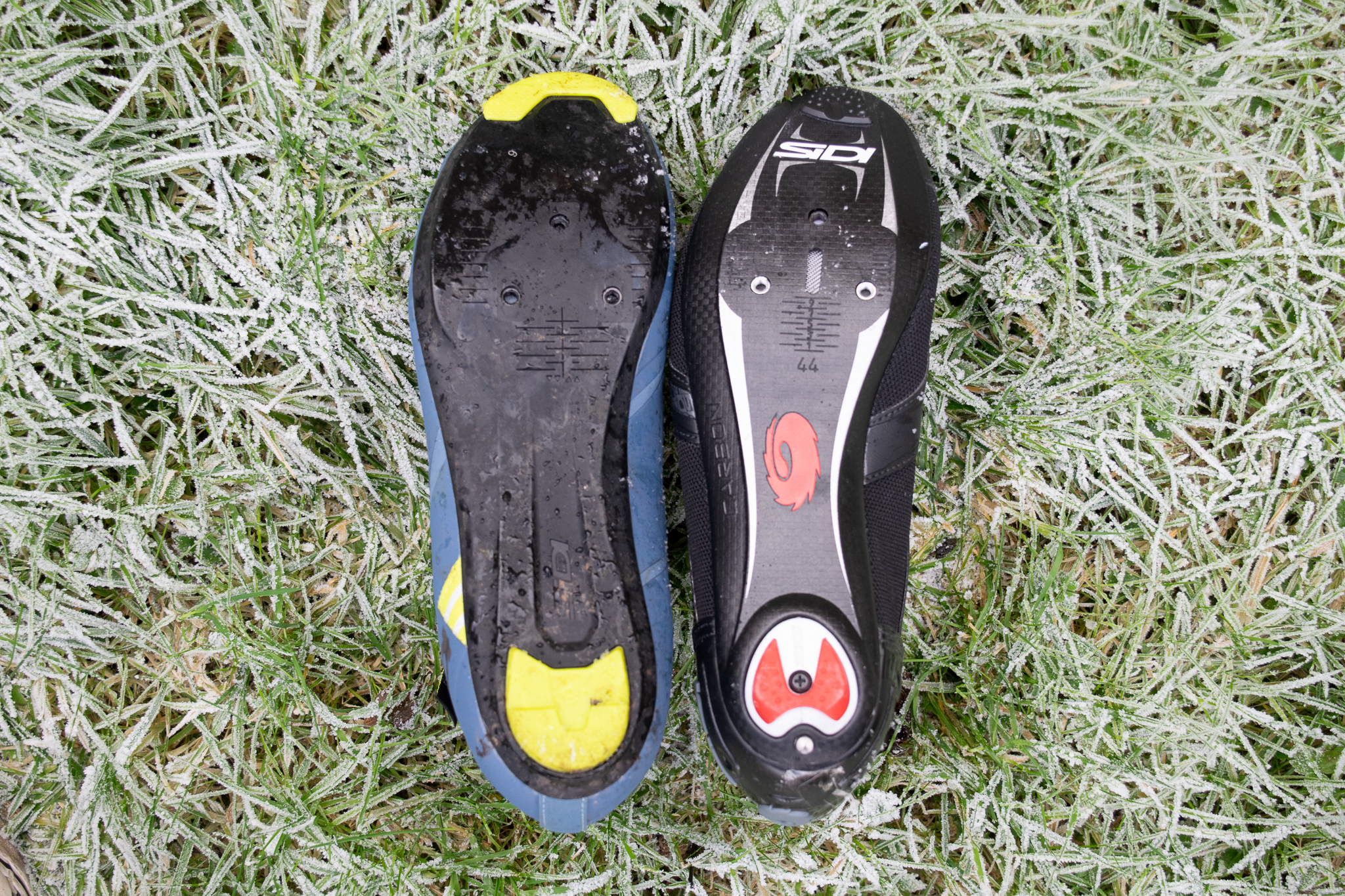 A blue Sidi Nix winter boot on frosty grass 