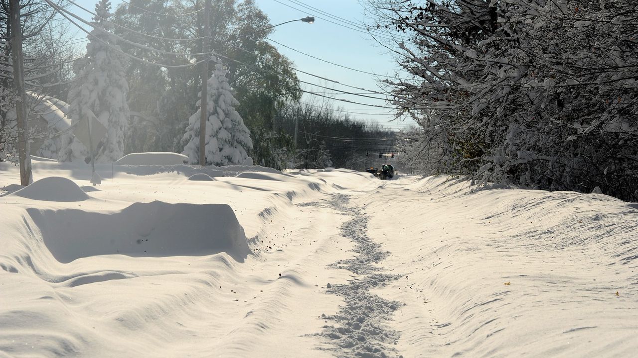 Footprints dot the road after an intense lake-effect thundersnow phenomenon 