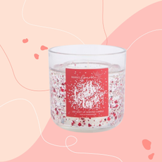 M&S light up Valentine's candle on pink background.