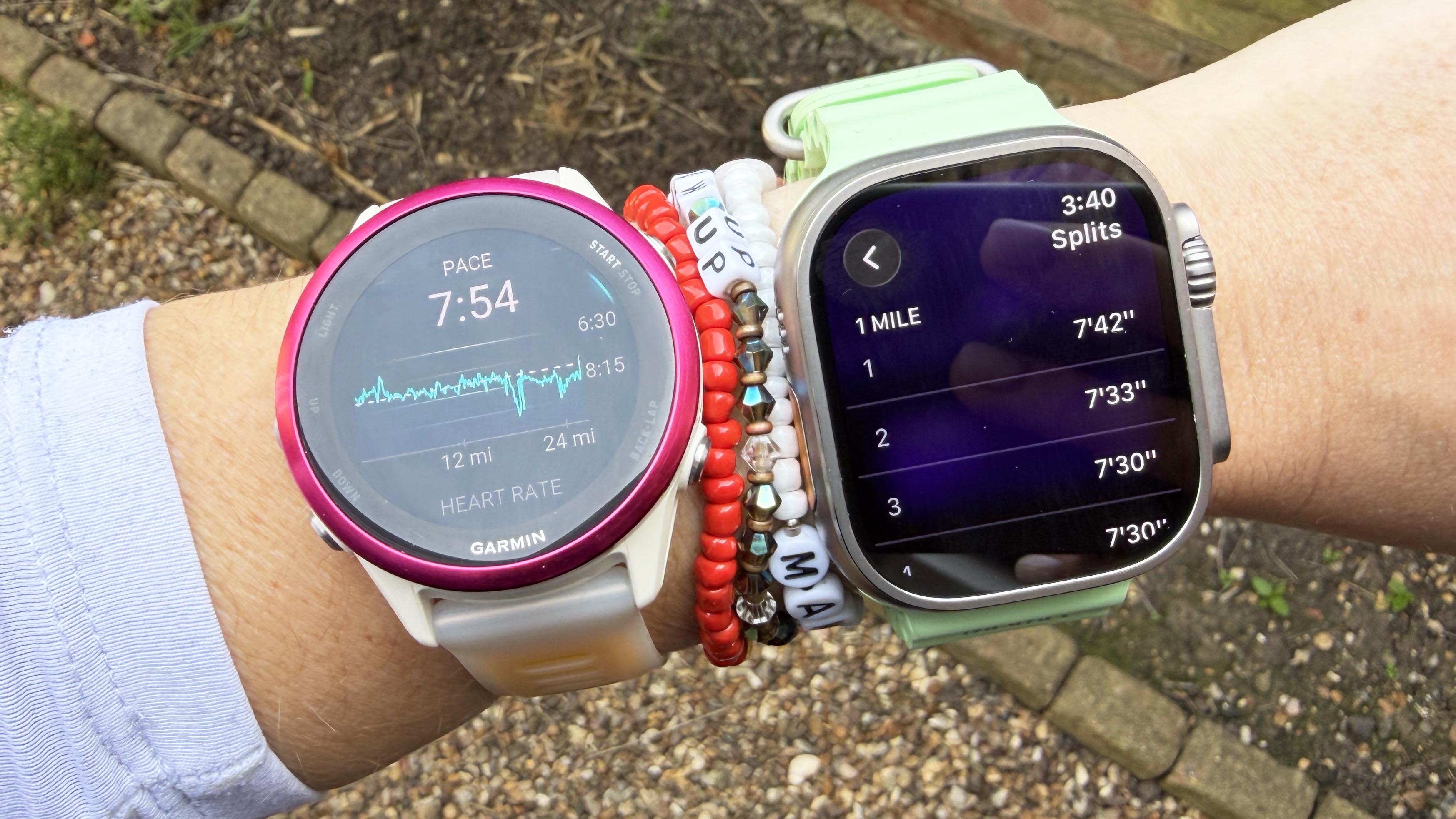 a photo of the Garmin Forerunner 570 and Apple Watch Ultra 3