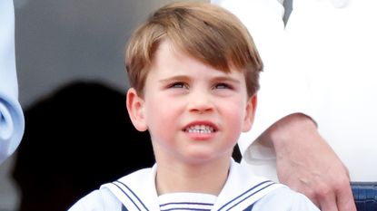 Prince Louis' birthday photos have a special detail. Seen here he watches a flypast 