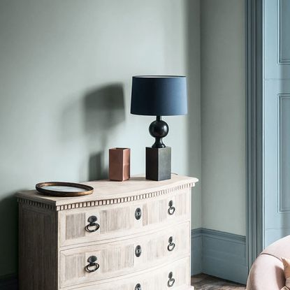 A pale blue room painted in Paint & Paper Library's Bluebird and Ice V