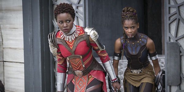 Lupita Nyong&#039;o as Nakia in Dora Milaje costume and Letitia Wright as Shuri in full costume in Black