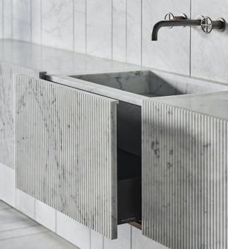 A natural stone sink in grey