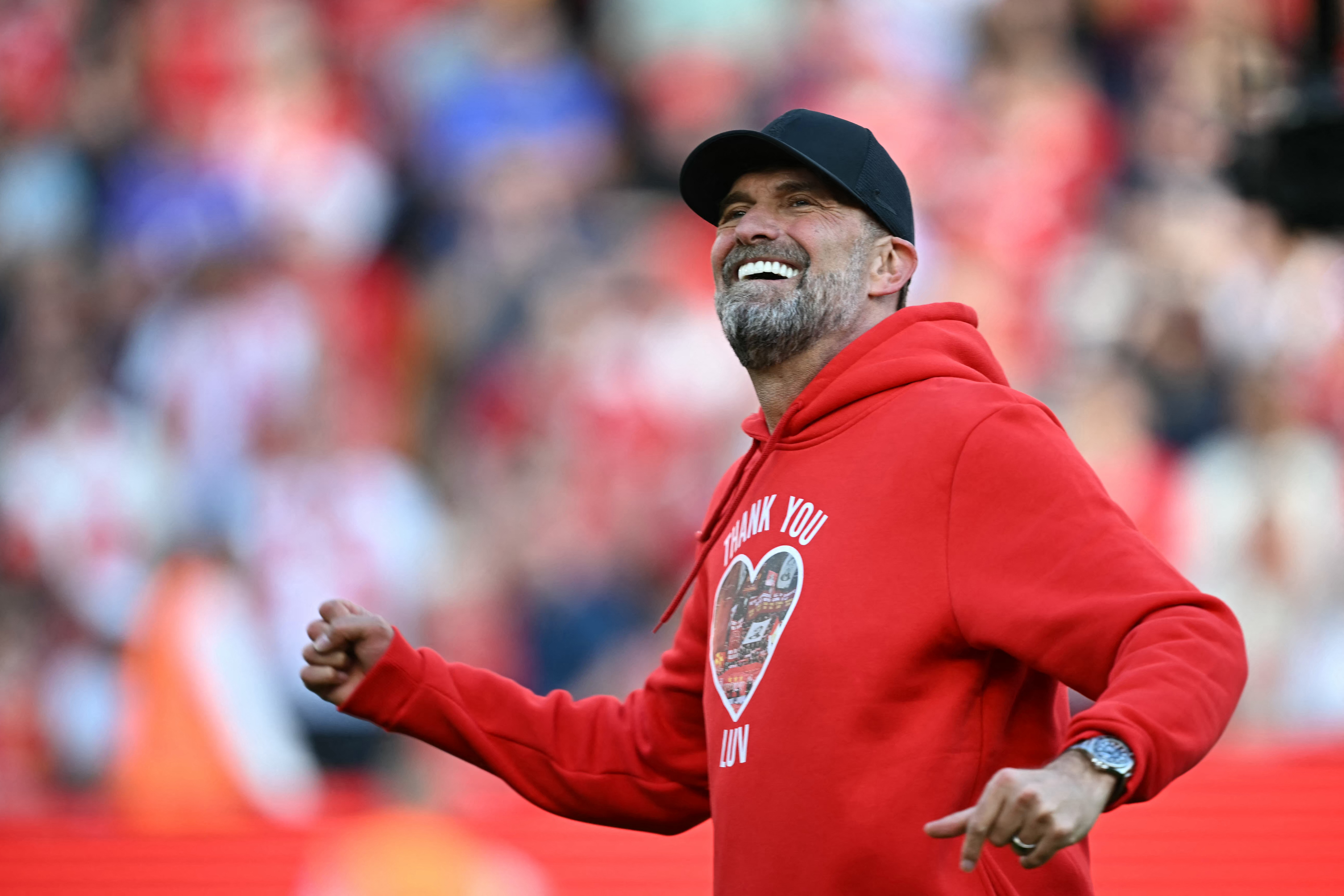 Jurgen Klopp smiles after his last game at Anfield as Liverpool manager in May 2024.