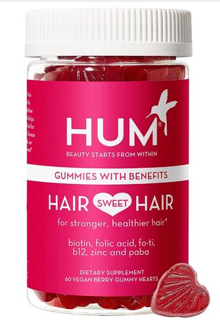 bottle of hair growth gummy vitamins