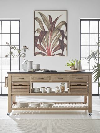 kitchen sideboard/kitchen island idea, white floor, artwork