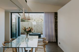 Dining room at 5 Fin Whale Way, a South African holiday home by Salt Architects