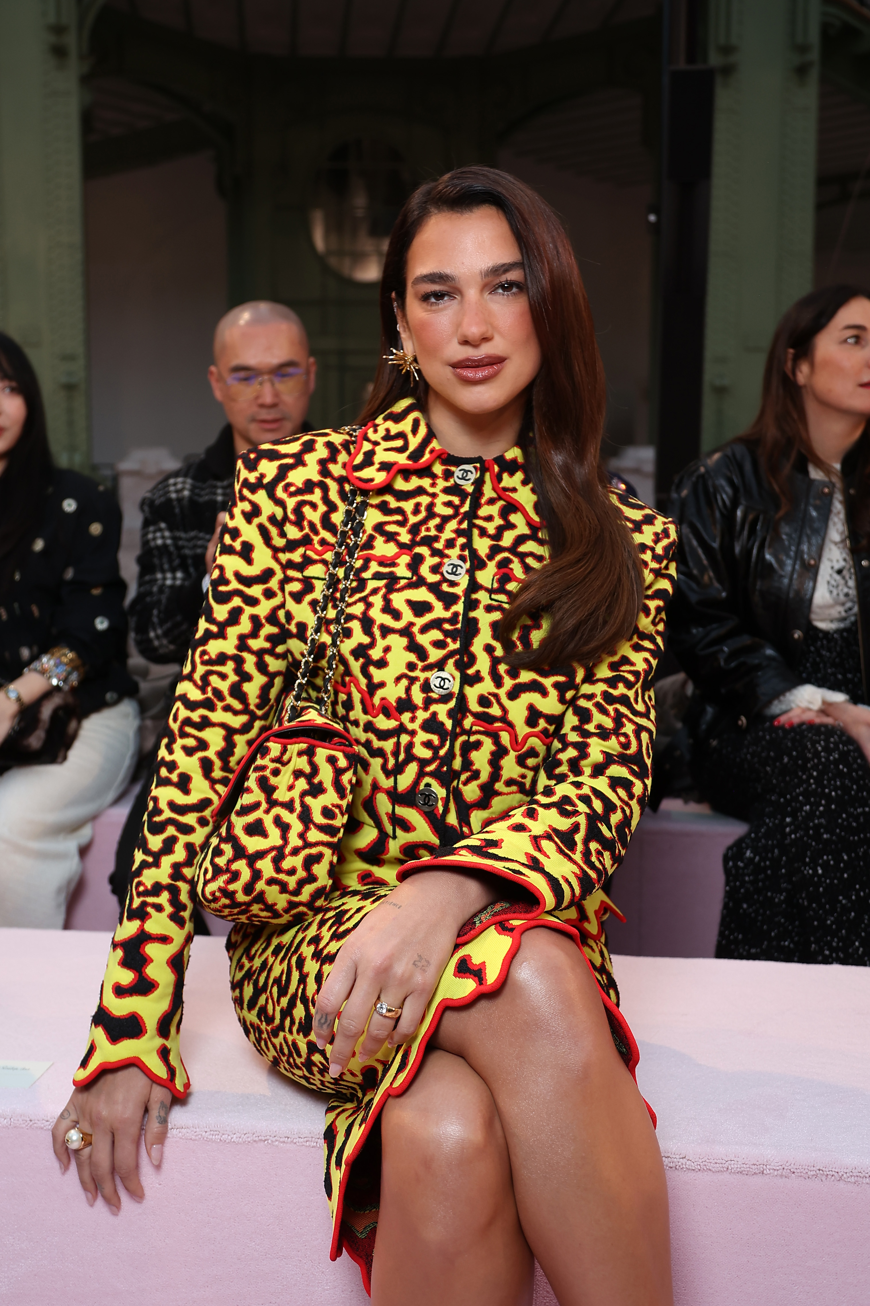 Dua Lipa attended Matthieu Blazy's debut Chanel couture show in a fiery skirt set from his M&amp;eacute;tiers d'Art Spring 2026 collection