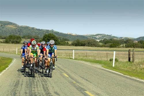 The group takes advantage of the sunny skies and smooth roads