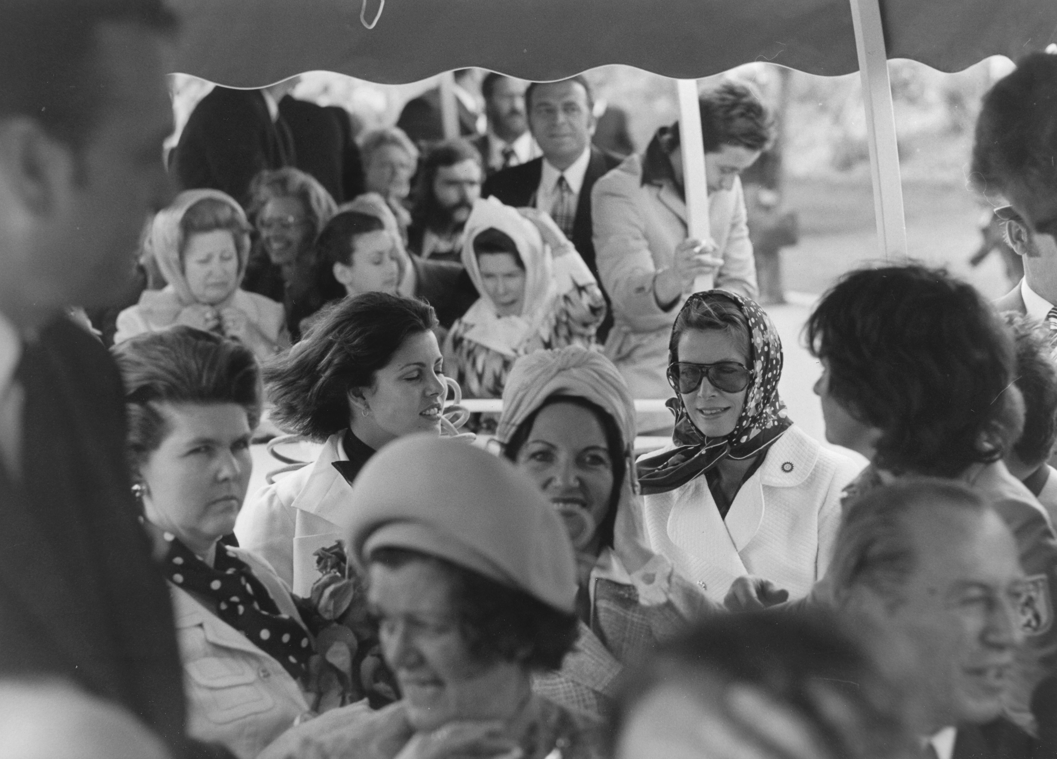 Grace Kelly in a crowd of people