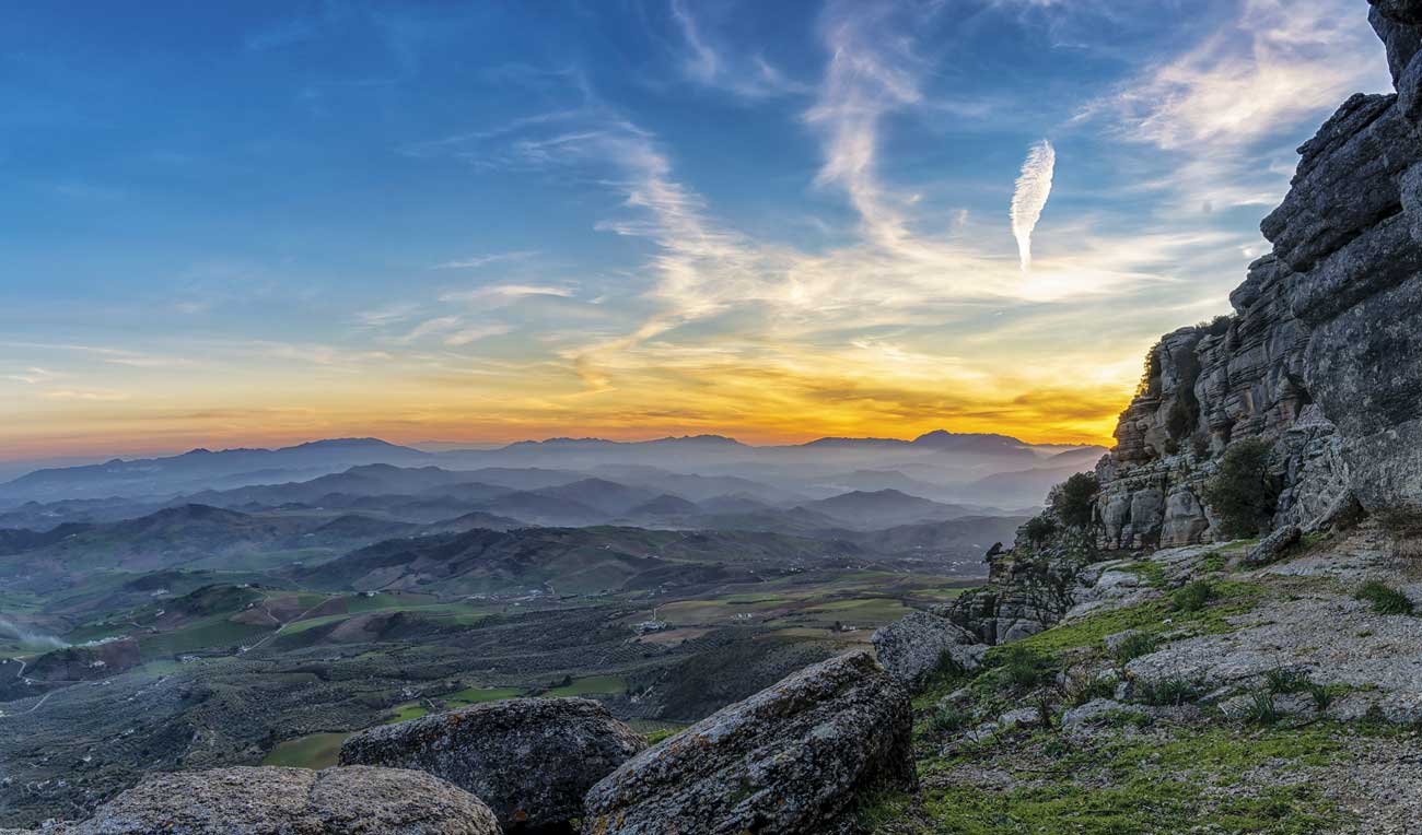 The karst limestone rockformations of El Torcal looking towards Montes de M&amp;aacute;laga natural park