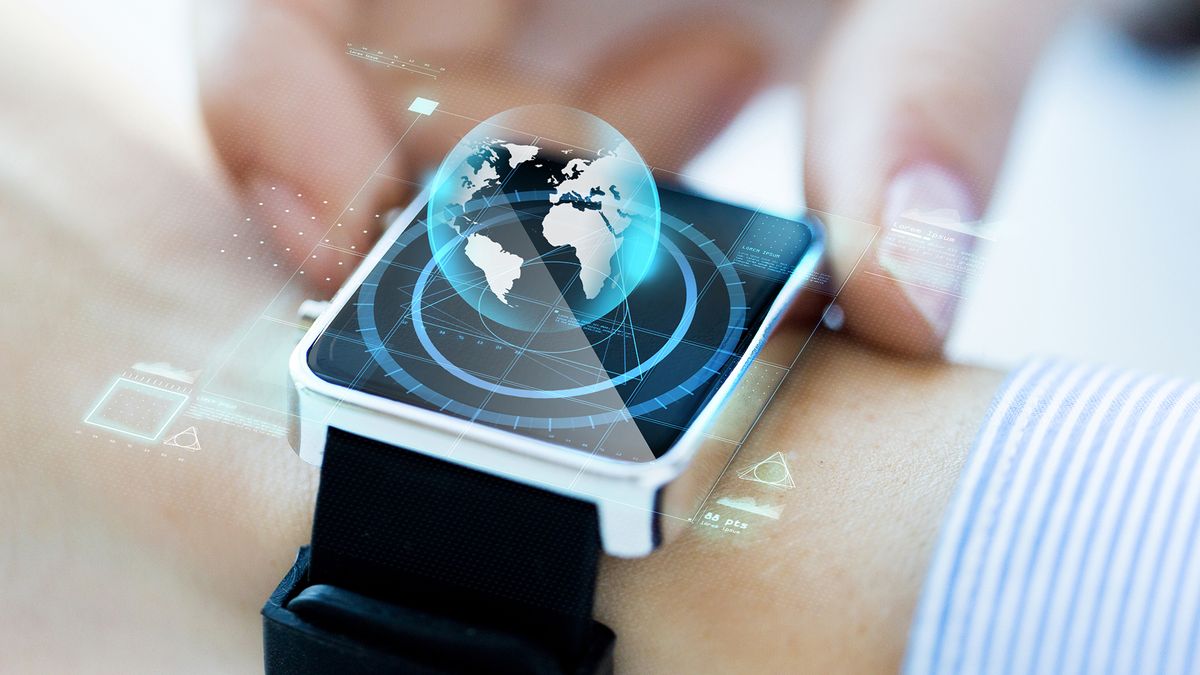 A futuristic smartwatch with a globe projected from it.